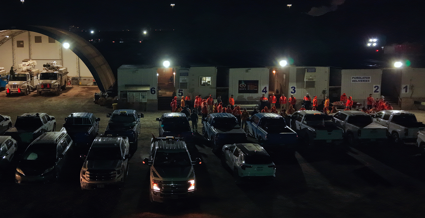 A team of working gathering at dawn for their morning meeting